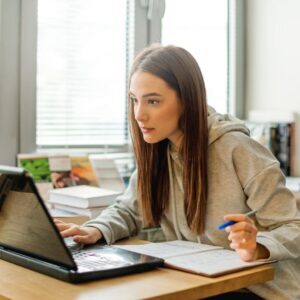 Woman studying at laptop