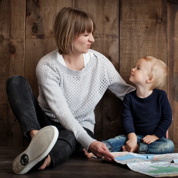 Mother and child looking at map.